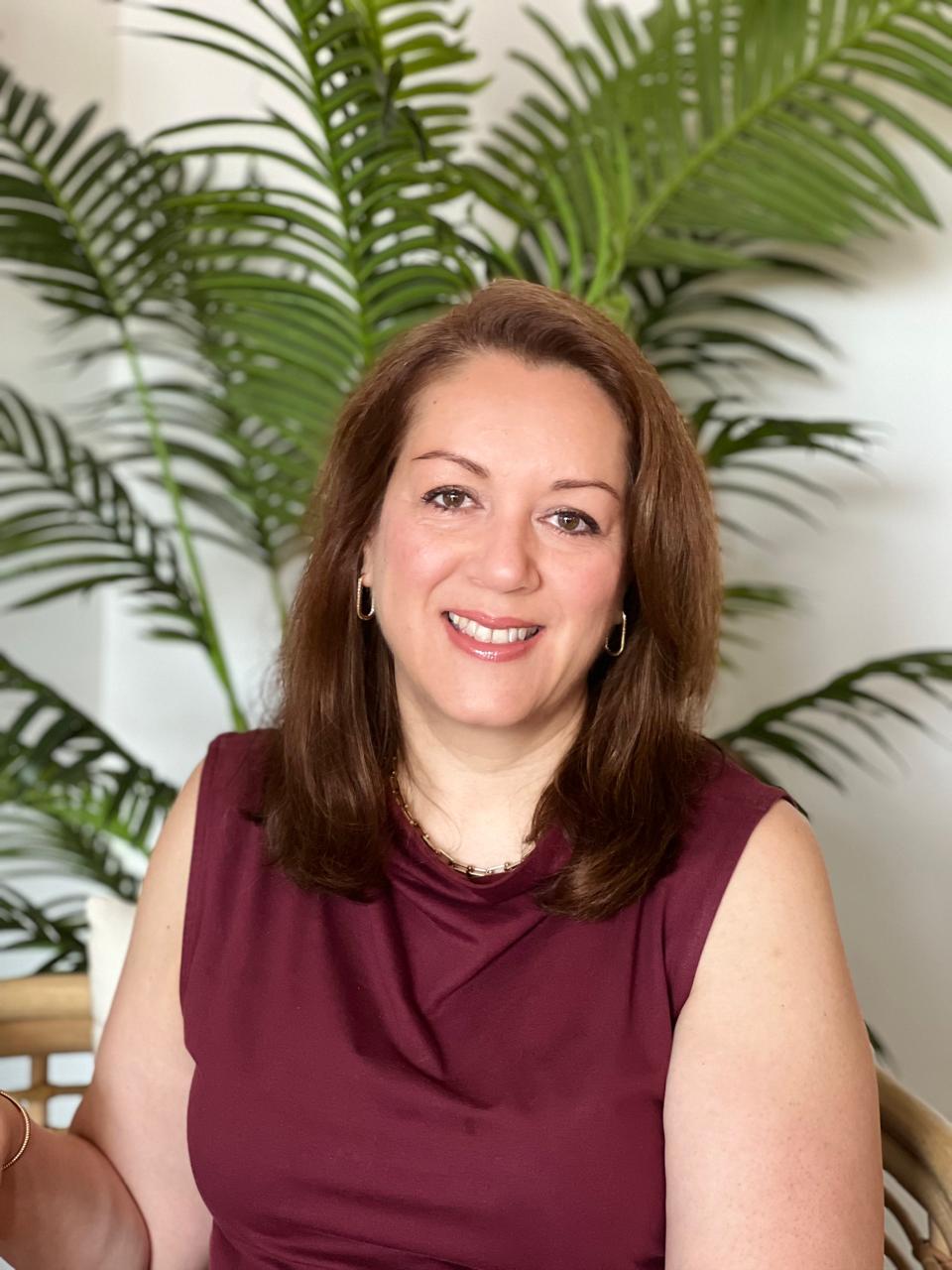 Dr. Sara Khawaja, pediatrician, smiling warmly